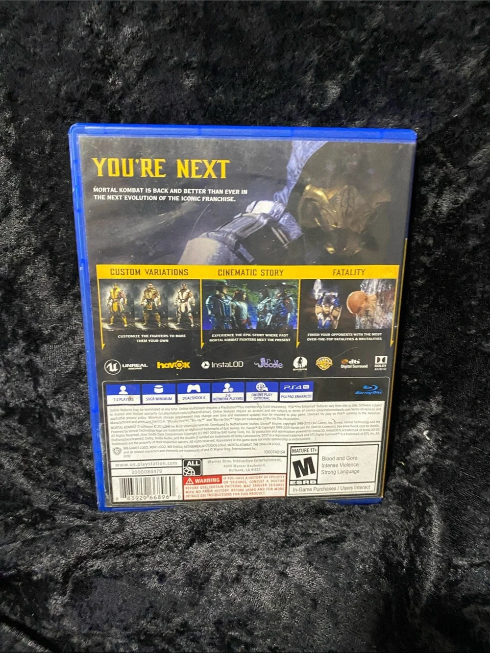 Sony PS4 Game Case with Blue Shell and Yellow Accents